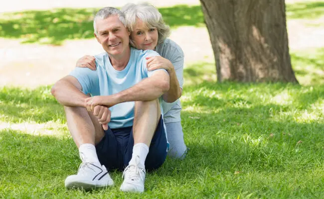 Retired couple on a lawn