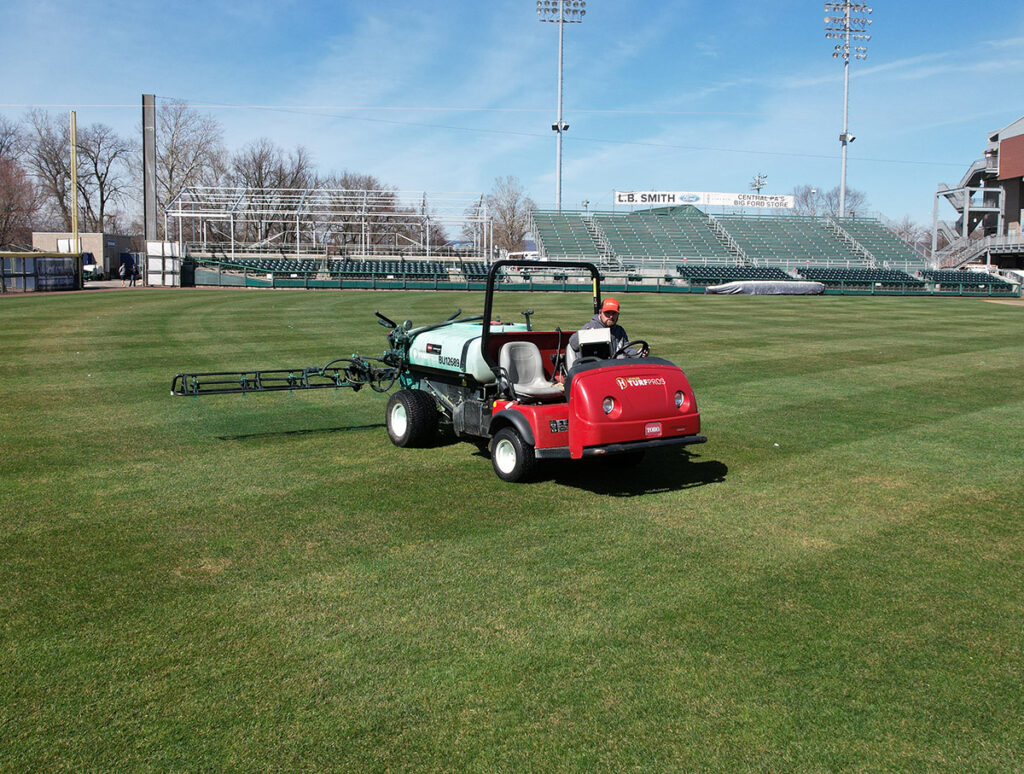 Spraying at an athletic field